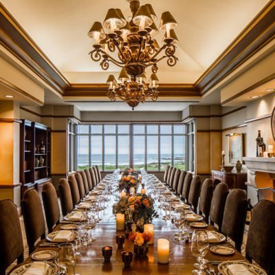 Private dining room with chandelier and ocean view