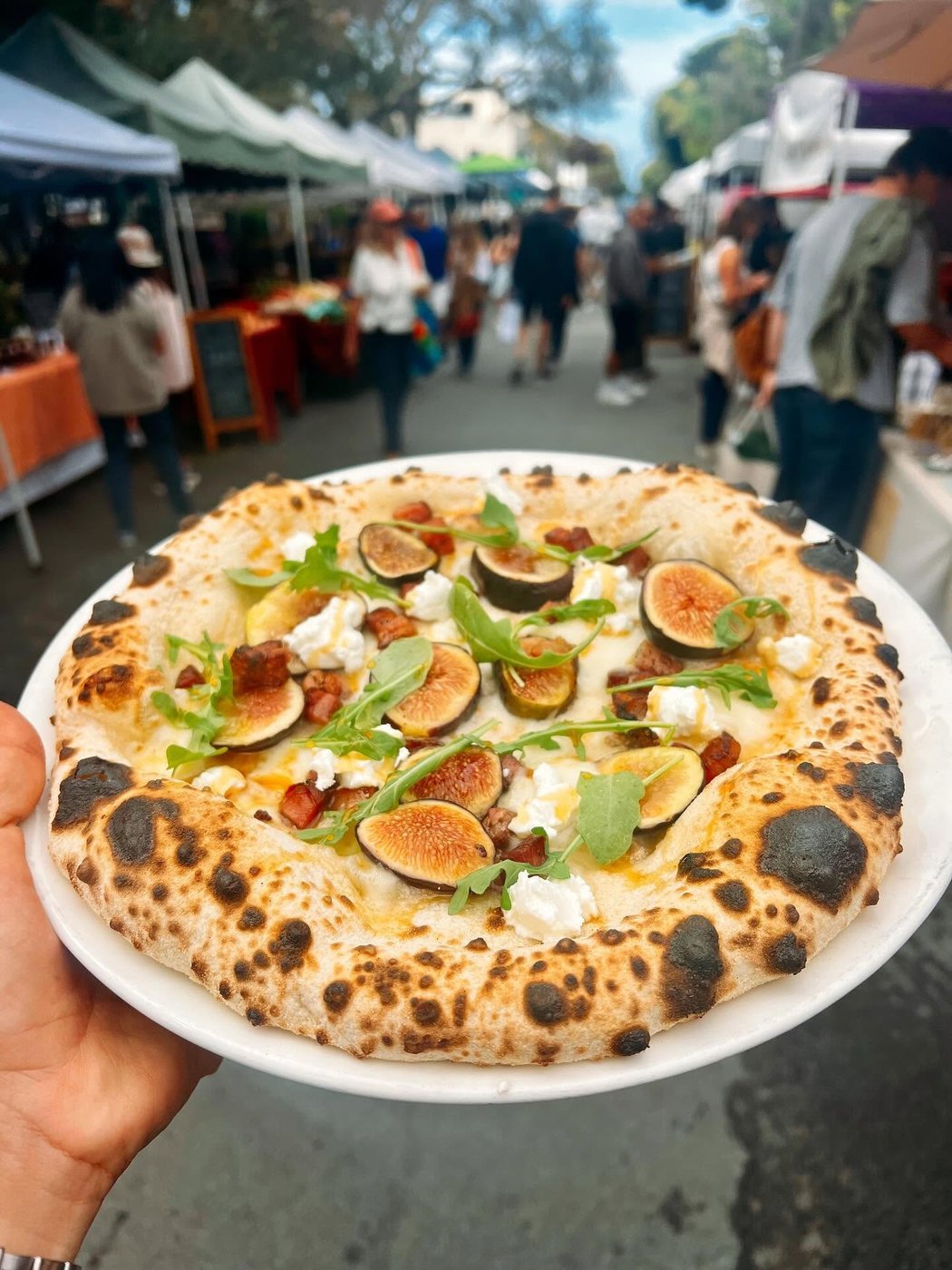 Fig, pancetta, ricotta and arugula pizza at the Carmel farmers market